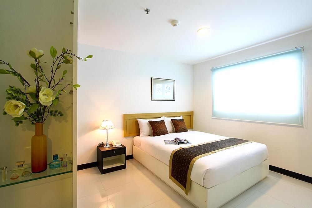 Laurel Suite Bangkok Habitación foto